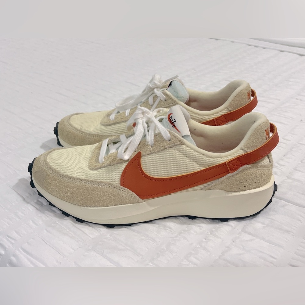 Nike women’s shoes  color/ cream and orange